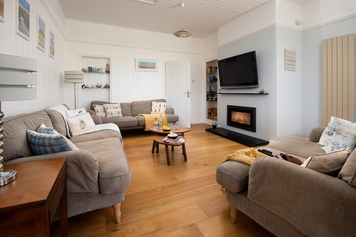 Driftwood Bamburgh - sitting room with Stovax Studio inset wood burner