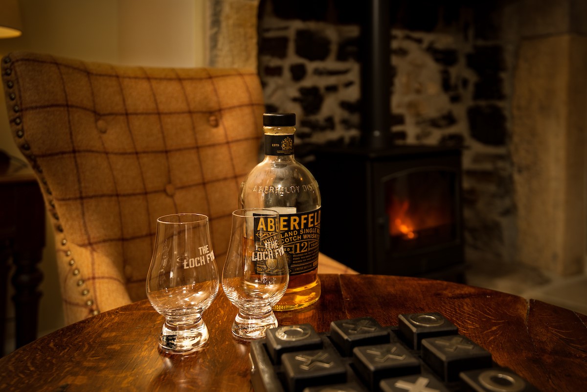 Aydon Castle Cottage - enjoy a dram and a game of noughts and crosses by the fire