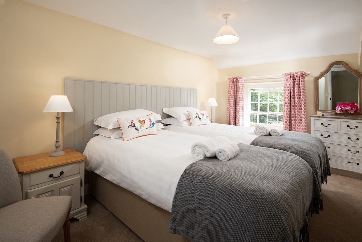 Aydon Castle Cottage - bedroom two with zip and link beds