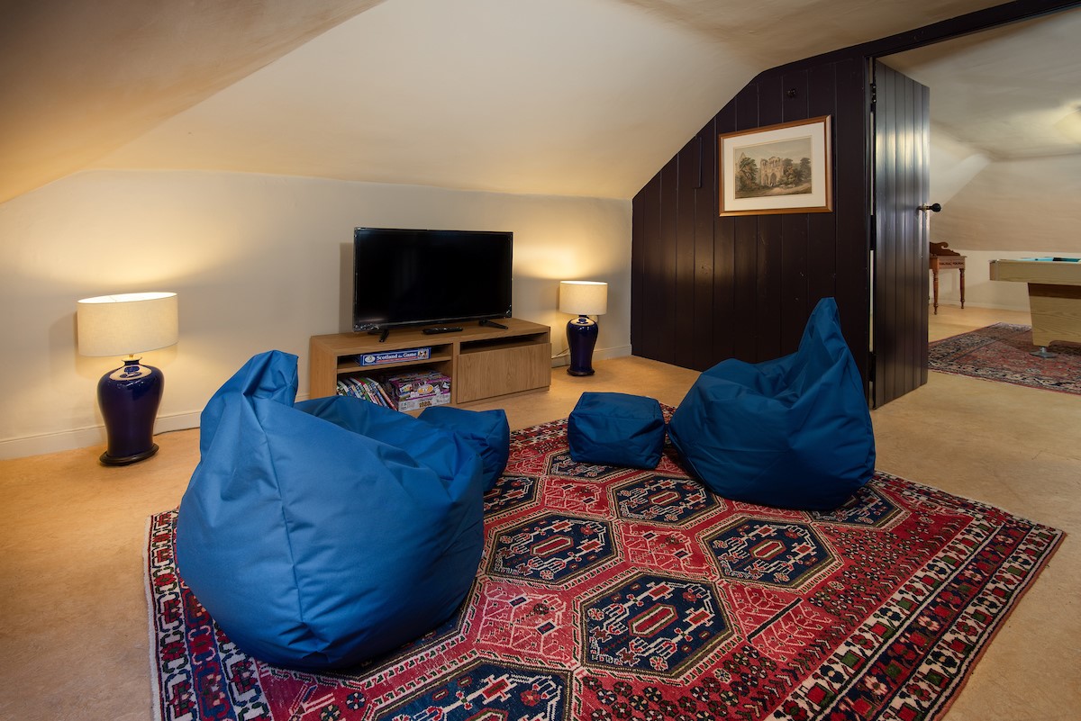 Cloister House - games room on the second floor with TV and beanbags
