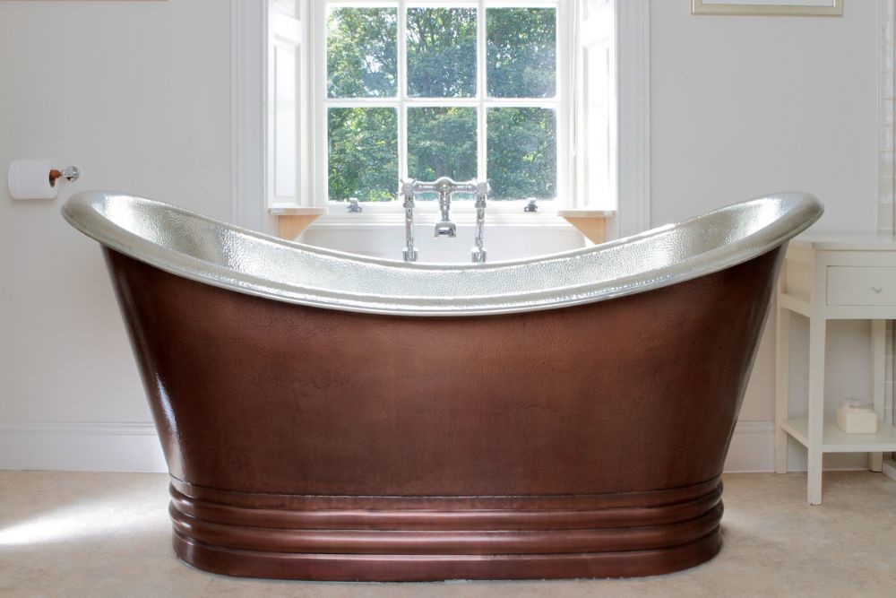Abbey House - the statement copper bath in bedroom one en suite bathroom