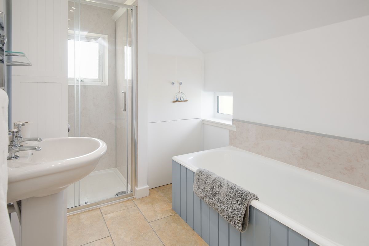 Beachcomber Cottage - family bathroom with bath and walk-in shower