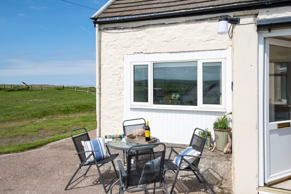 Beachcomber Cottage - sit outside and enjoy the fresh sea air