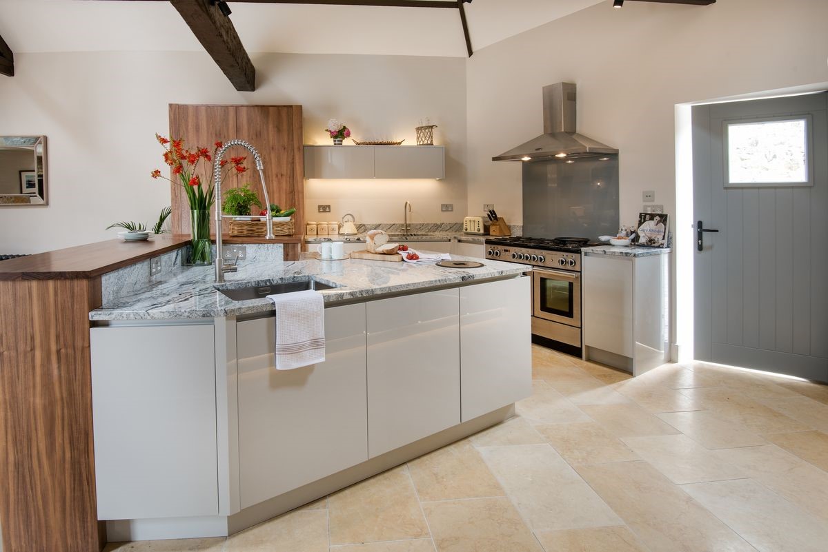Coach House - the open-plan kitchen with double Range cooker and island