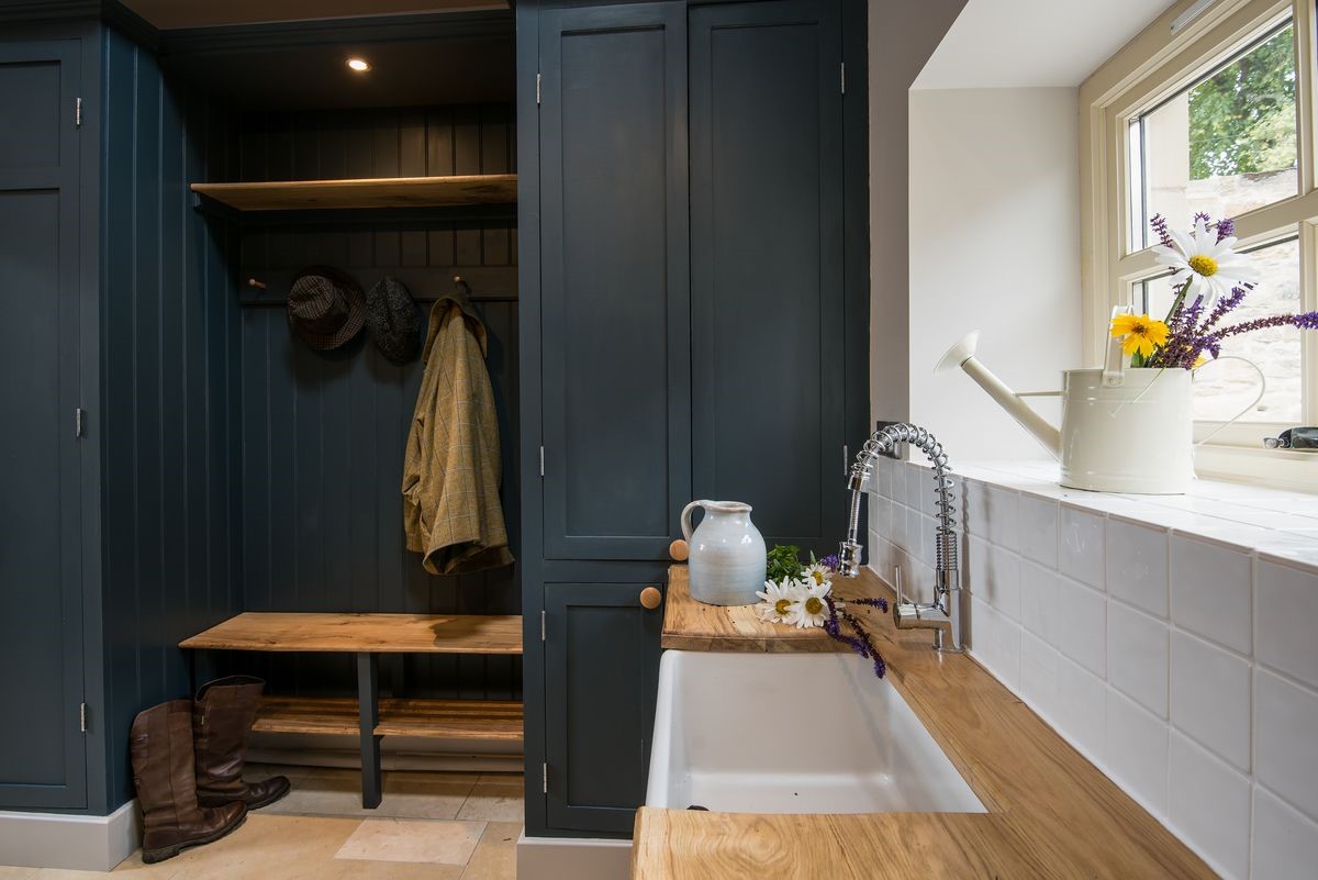 Coach House - boot room with Belfast sink and plenty of space for boots and hanging outdoor kit