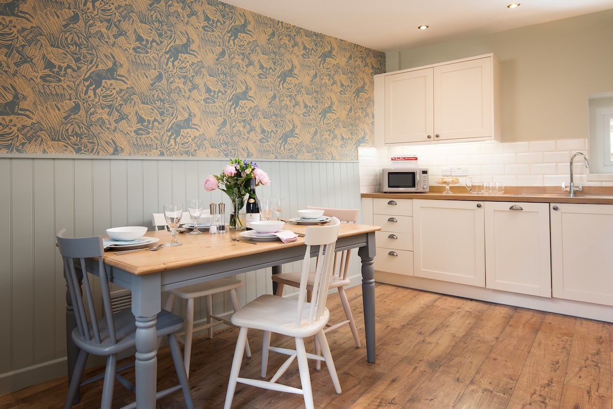 Campsie Cottage - beautifully decorated, this is a light-filled spot in which to enjoy informal meals at the timber dining table