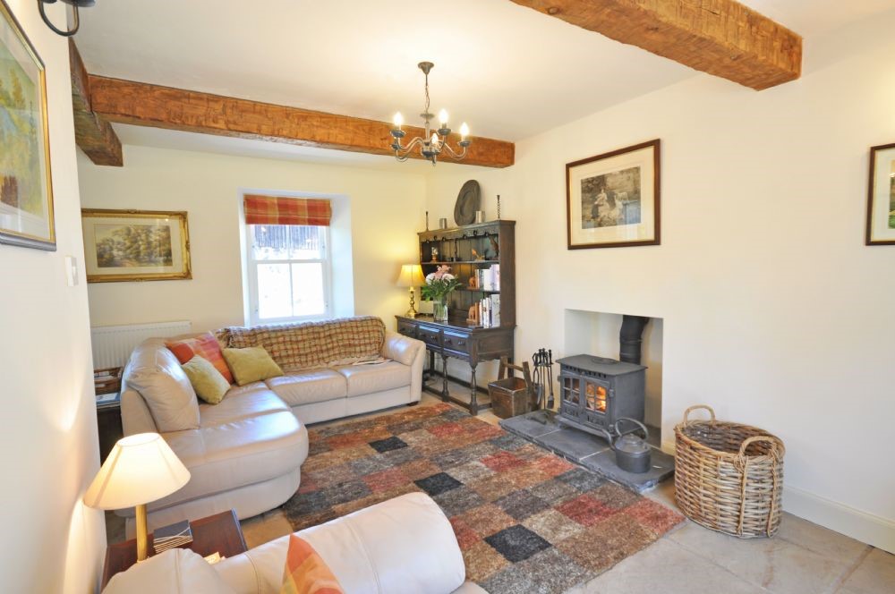 Old Mill Cottage - sitting room with wood burning stove