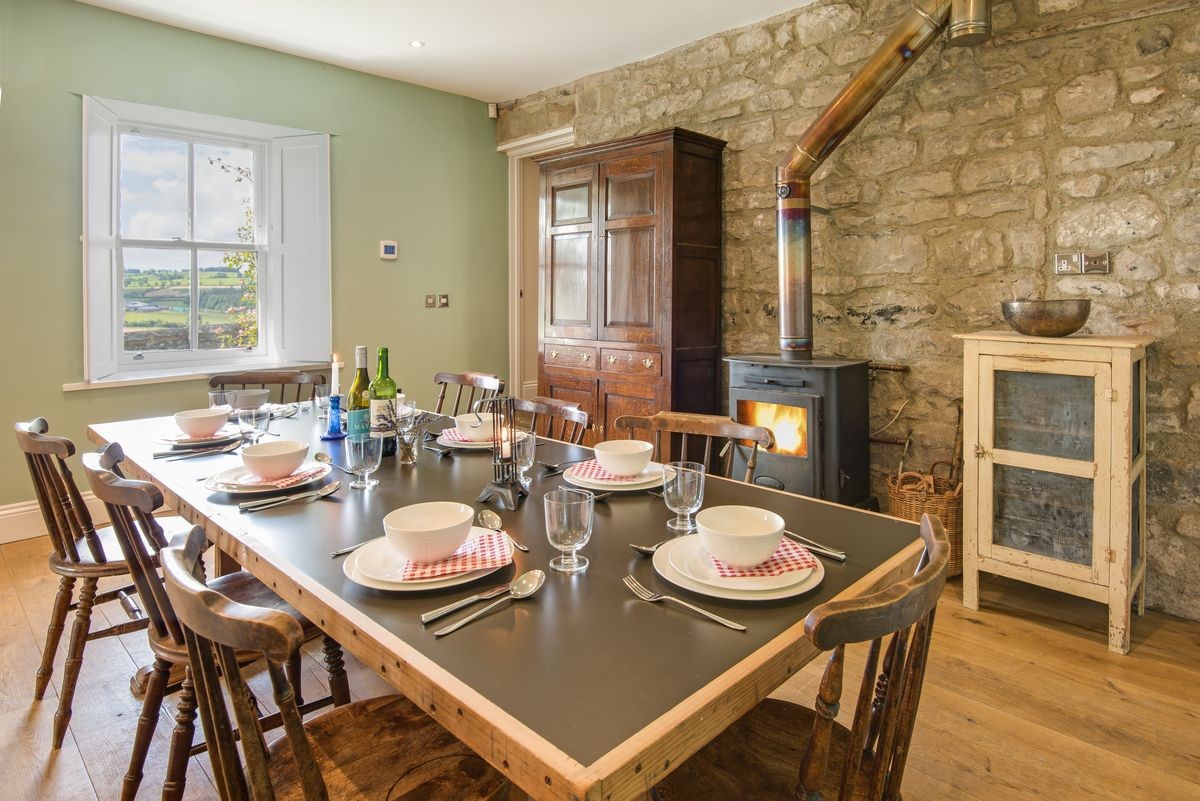 Overthwarts Farmhouse - dining table & wood burning stove