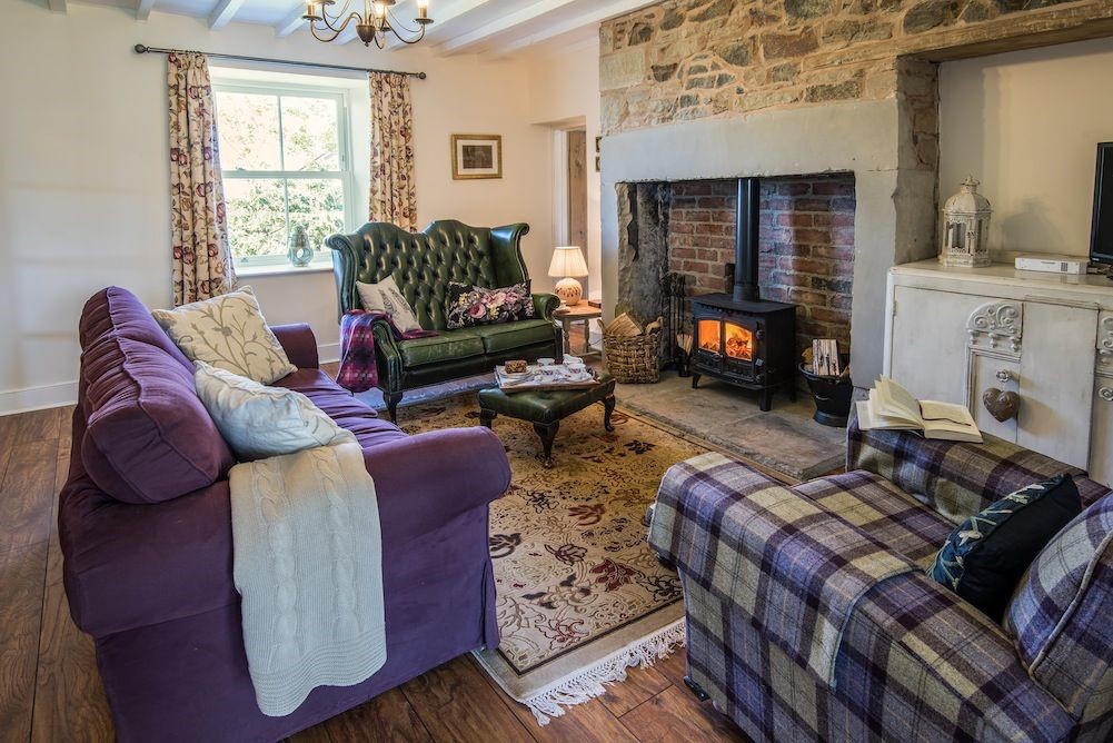 Well House - sitting room with wood burning stove