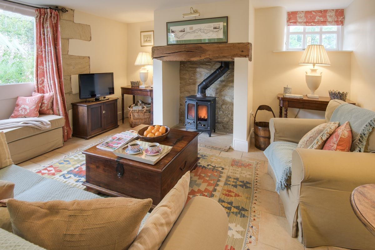 West Cottage - sitting room with wood burning stove