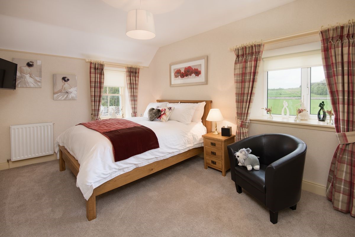 Dryburgh Stirling Two - bedroom two with king size bed, TV, side tables and chair