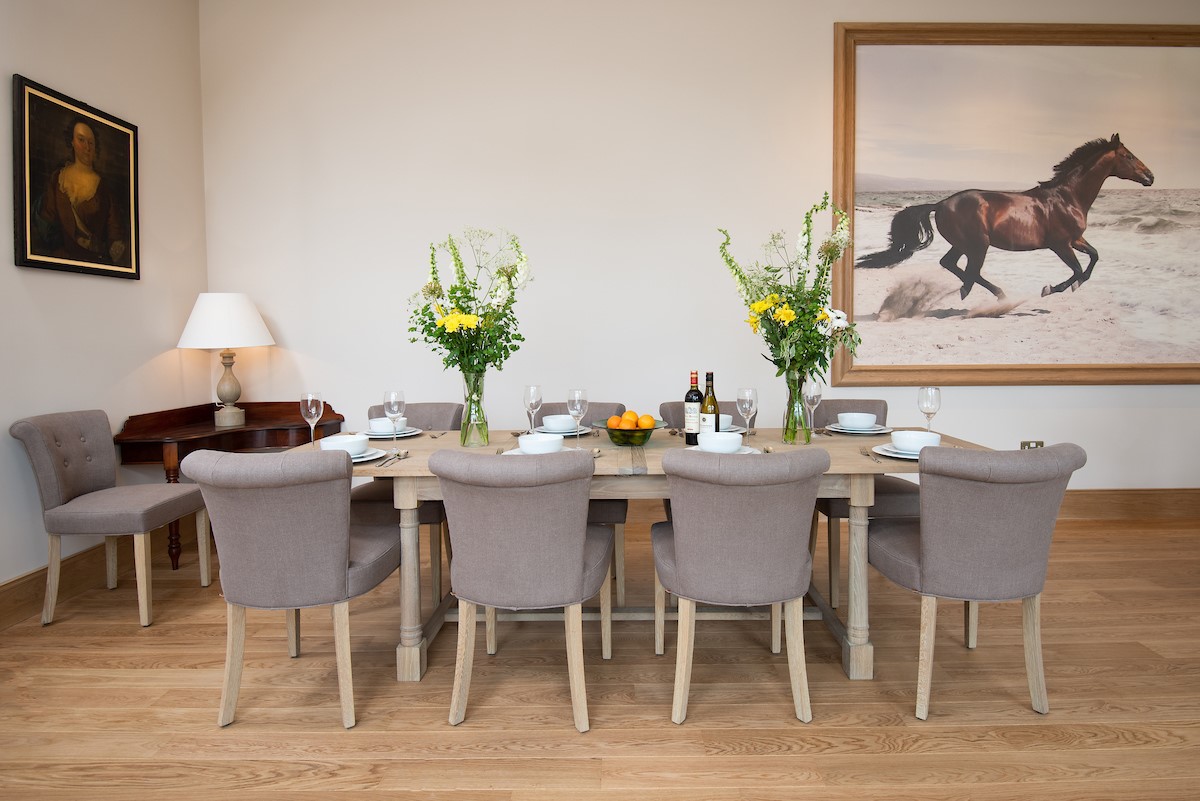 Beeswing - dining table with seating for eight guests