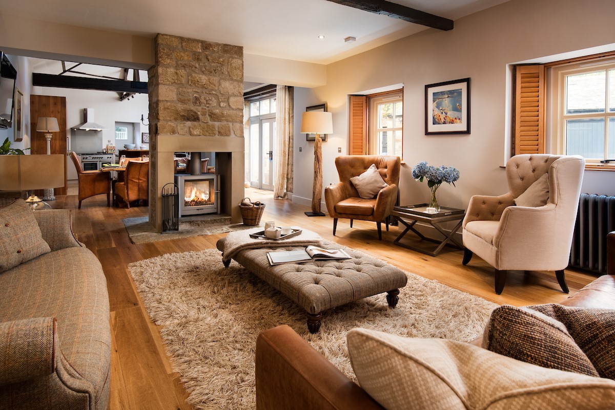 Coach House - stylish open-plan sitting room with plenty of seating