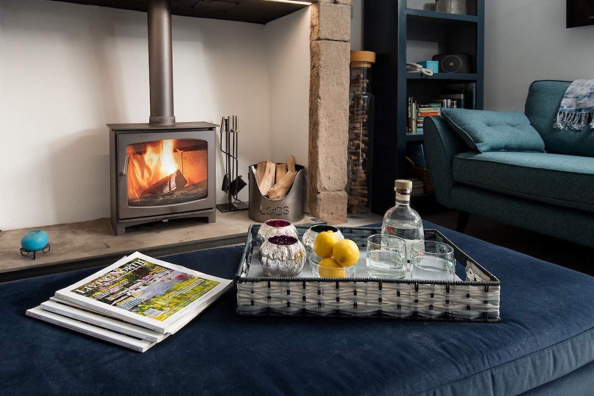 Red Herring - enjoy a drink in front of the cosy log burner in the sitting room