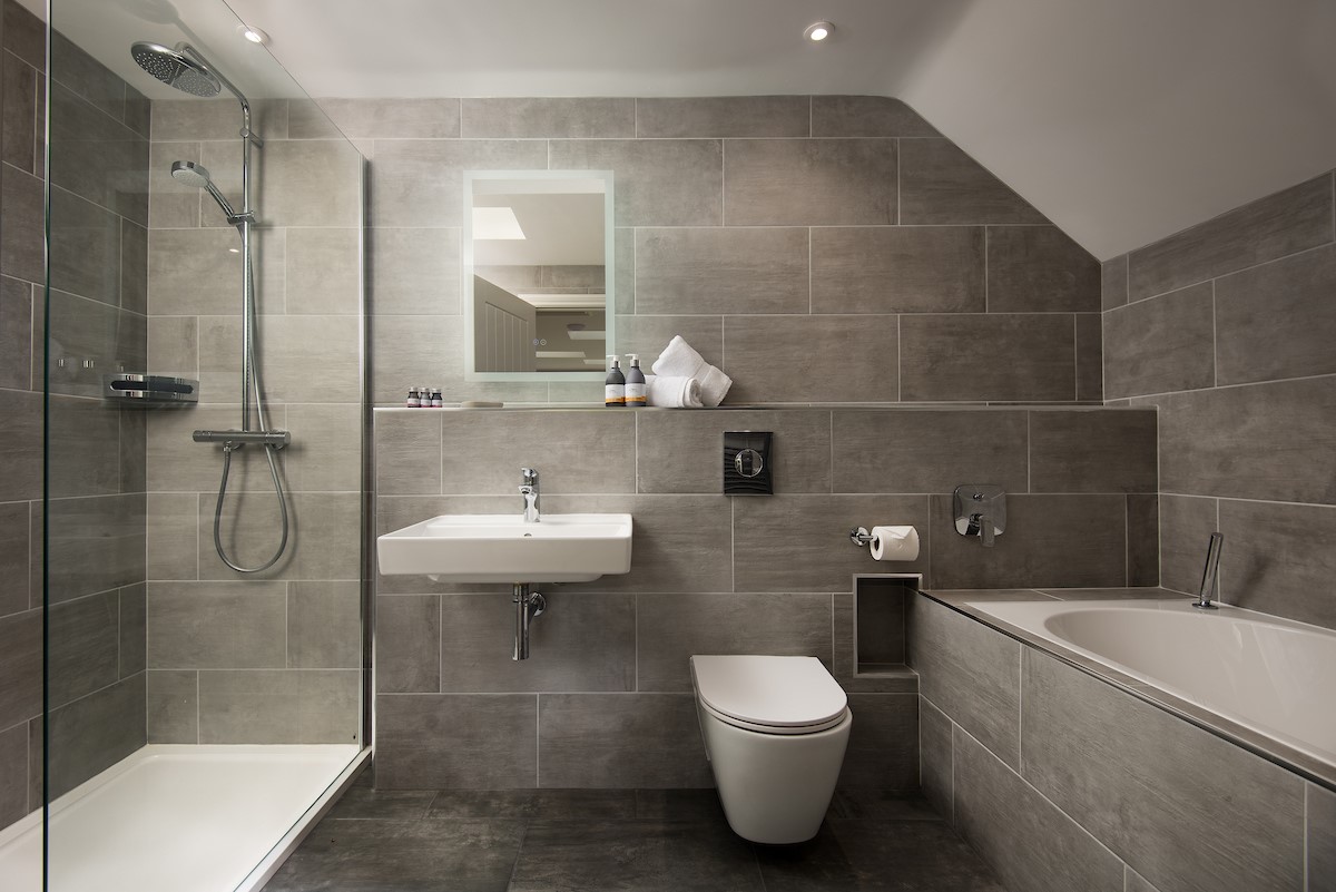 Lucy - en suite bathroom with large walk in shower and separate bath