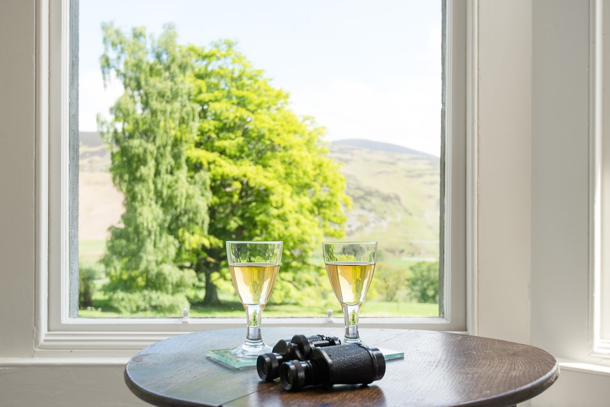 Mossfennan House - unwind with a glass of fizz while enjoying the fabulous views