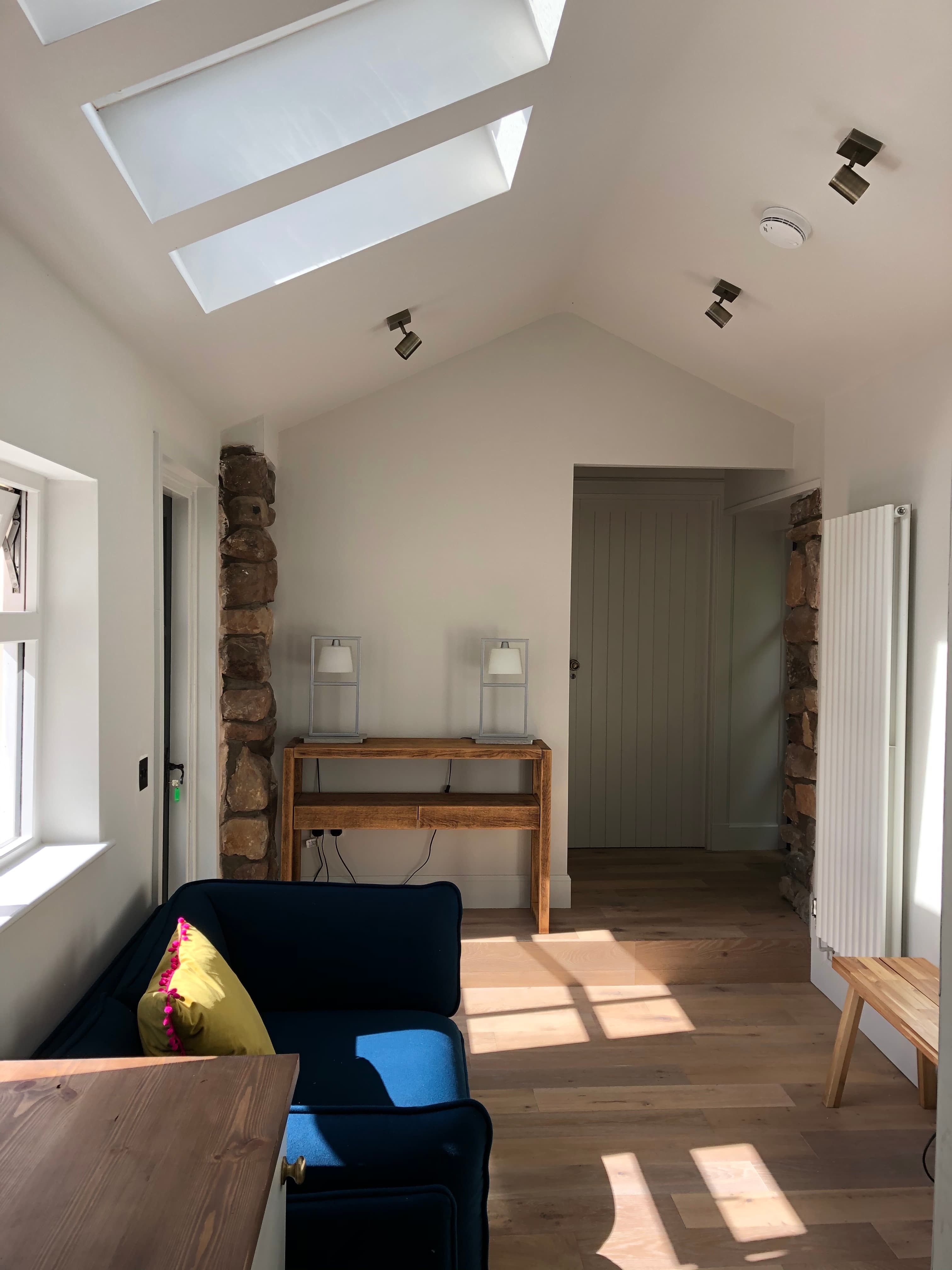Shiloh Cottage - snug with sofa and velux windows