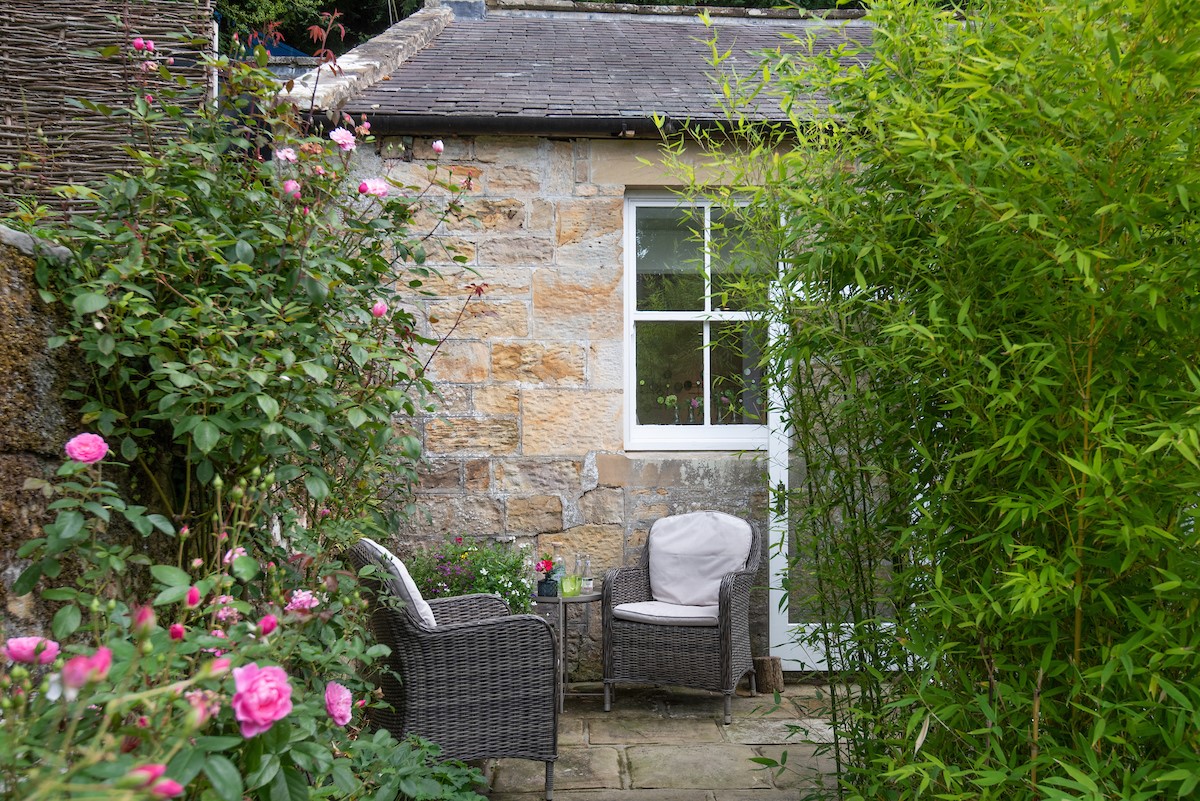 Priory Cottage - tranquil outdoor seating area for guests