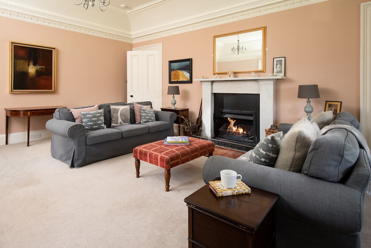Mossfennan House - relax on the comfy sofas in front of the cosy open fire