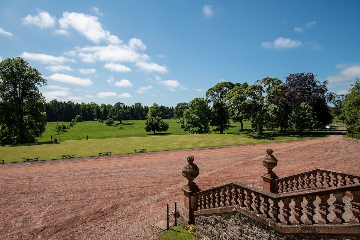 Thirlestane Castle - view from the castle over gravelled area and extensive parkland