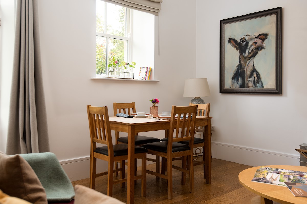 Priory Cottage - dining area with seating for four guests