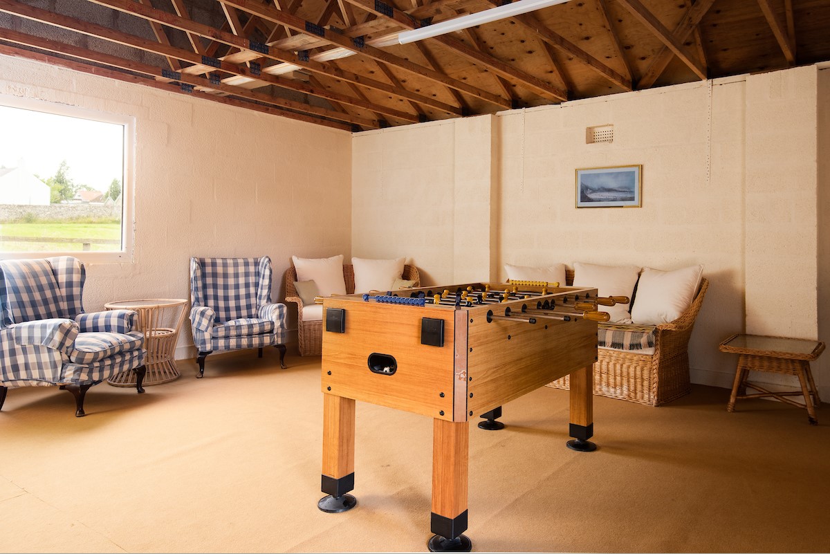 Wark Farmhouse - games room with table football and ample seating