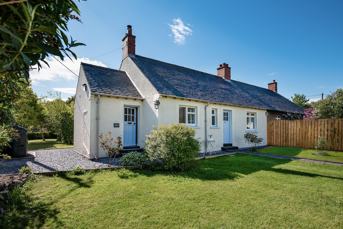 Kilham Cottage - rear aspect of the property and enclosed lawned garden
