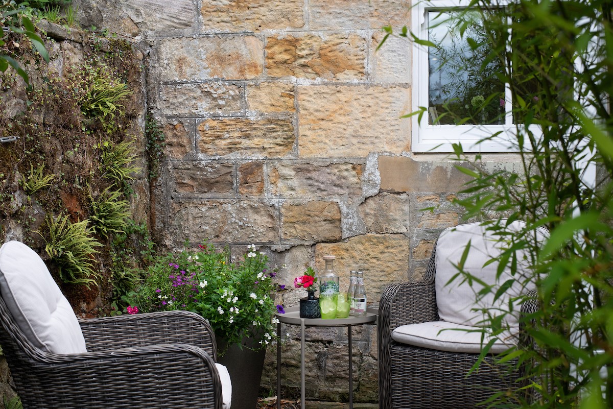 Priory Cottage - relax and unwind in the outdoor seating area