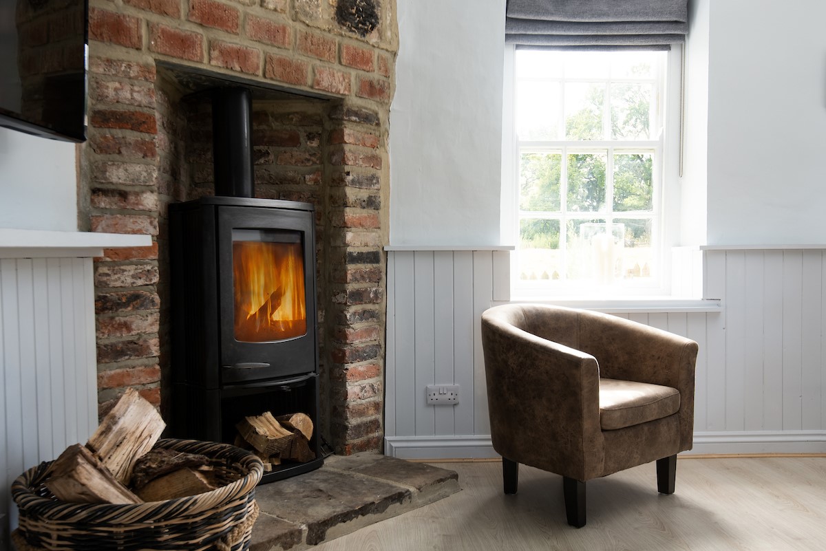 Blakey House - modern wood burning stove in the sitting room