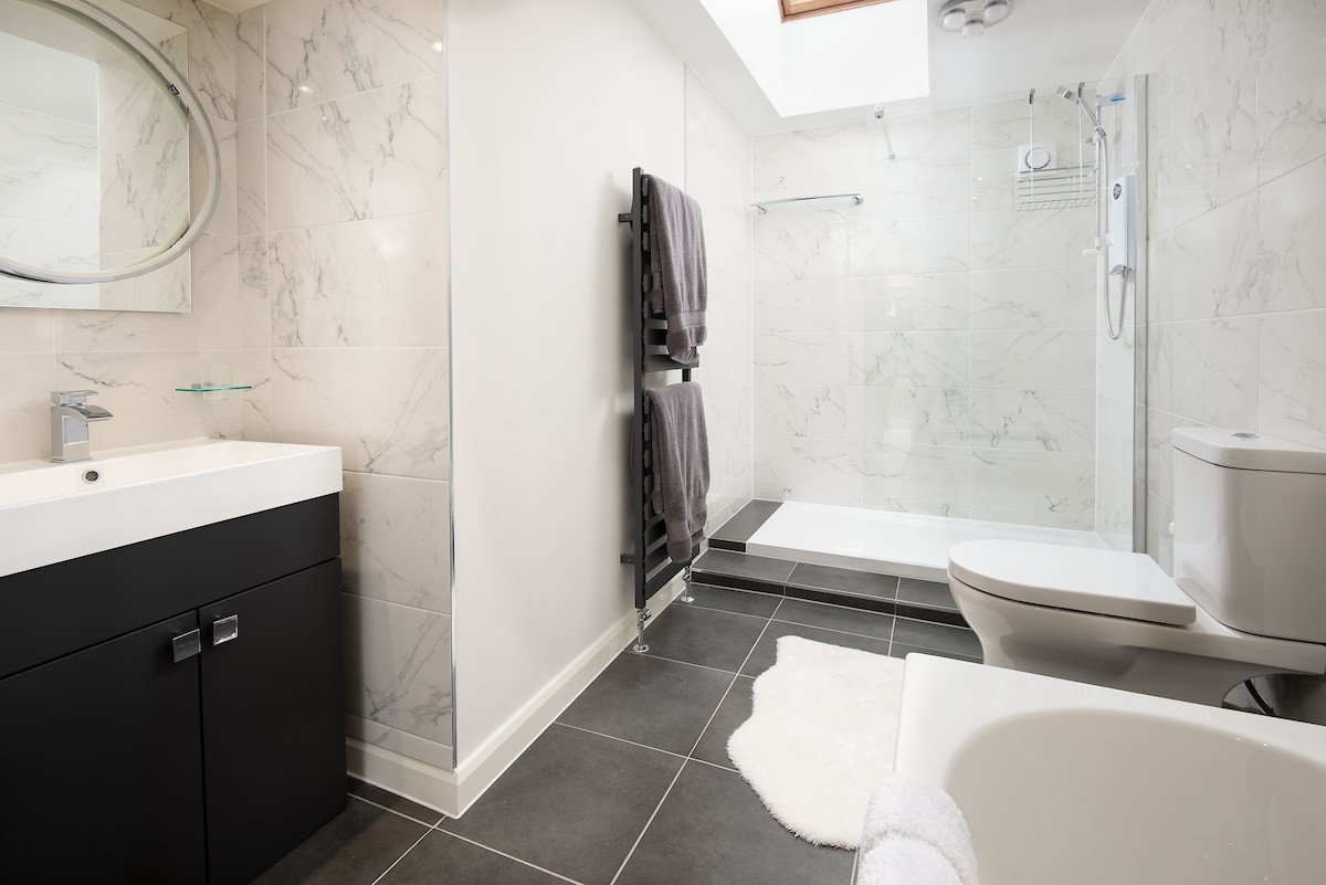 Westwood Cottage - the family bathroom benefits from a bath and separate large walk-in shower
