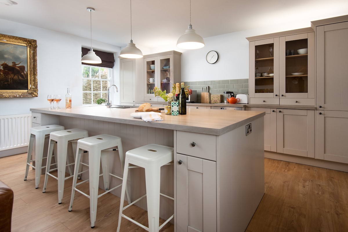 Cuthbert House - open plan kitchen with island and breakfast bar