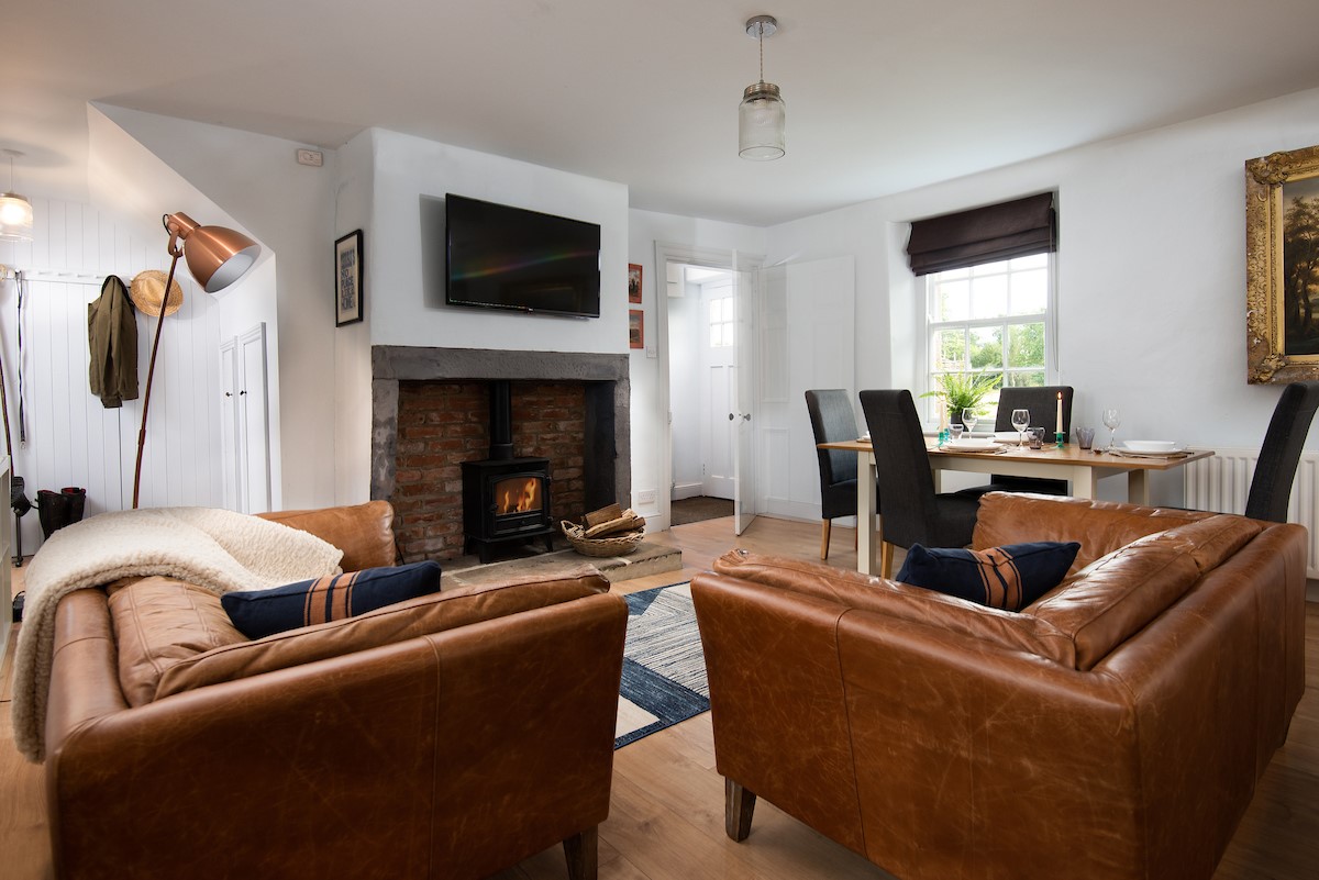 Cuthbert House - sitting room with wood burning stove