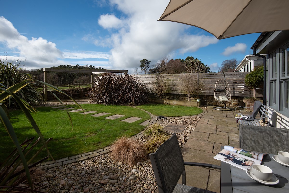 Number Nine, Lanchester -  the large garden terrace, pergola area and cute Egg chair in the garden