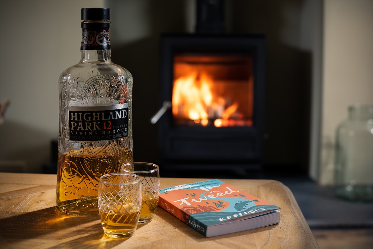 Campsie Cottage - curl up for cosy evenings next to the dancing flames of the wood burner