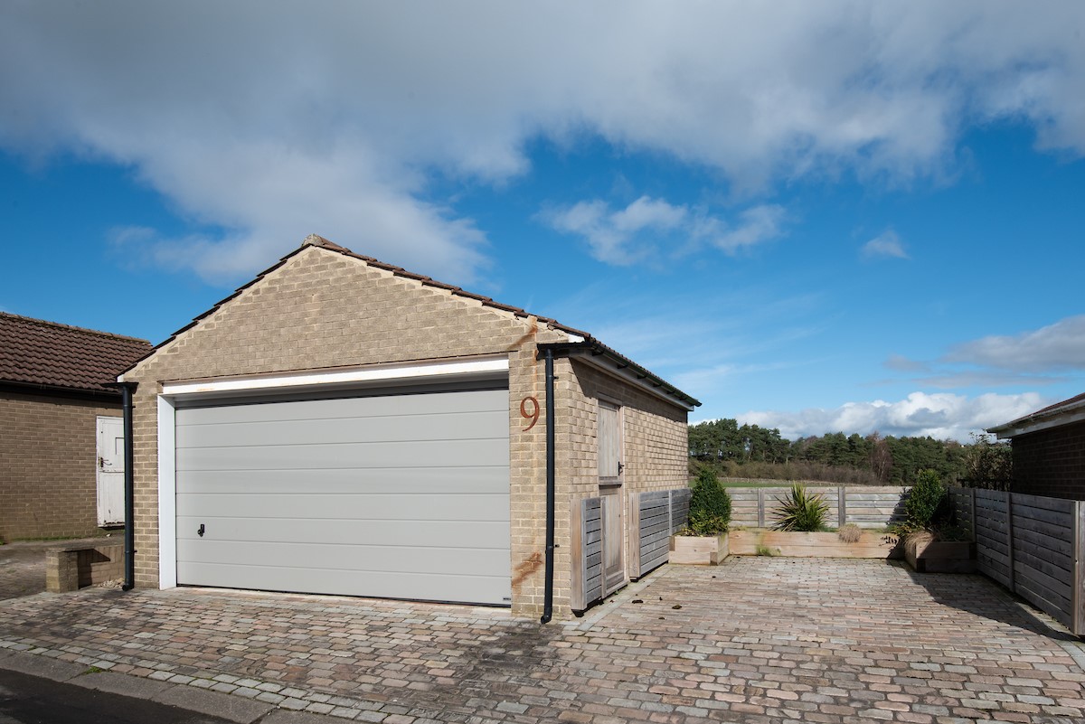 Number Nine, Lanchester - the parking area with double garage available for secure bike storage