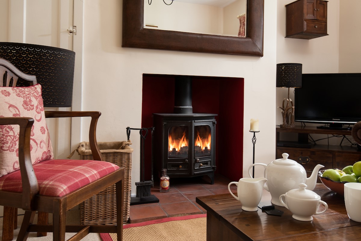 Kilham Cottage - enjoy a cup of tea in front of the cosy wood burner