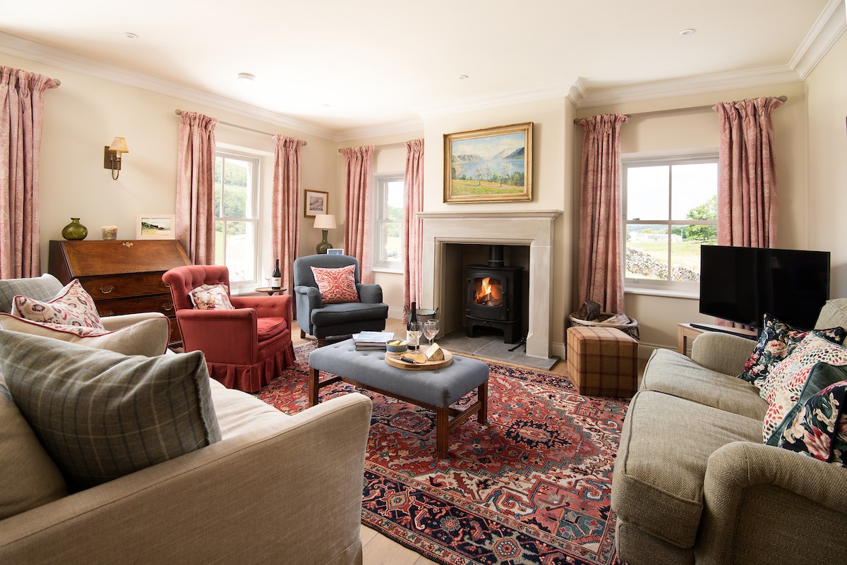 Housedon Haugh - the warm and welcoming lounge with a woodburning stove