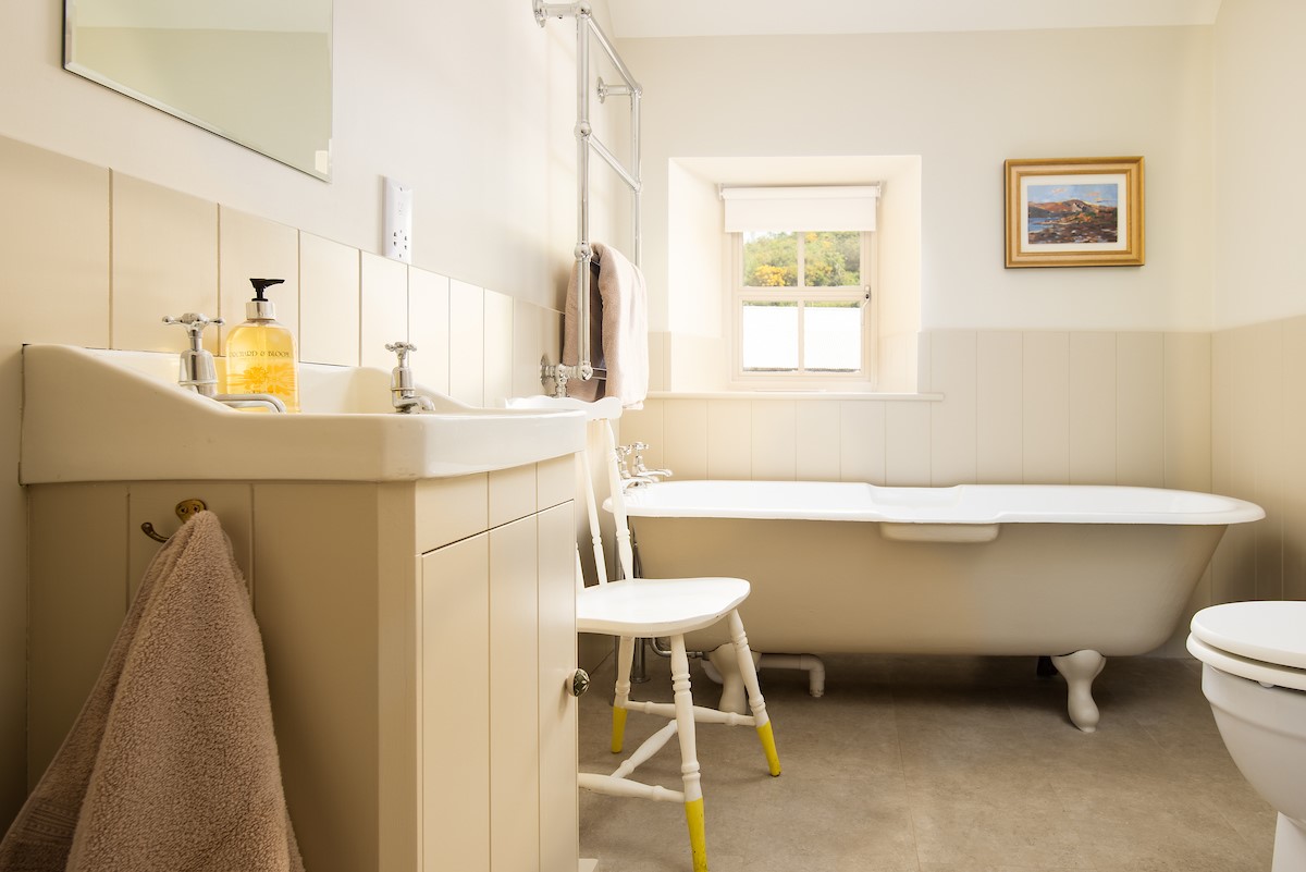 Houseden Haugh -  bedroom three en-suite bathroom with a roll-top bath