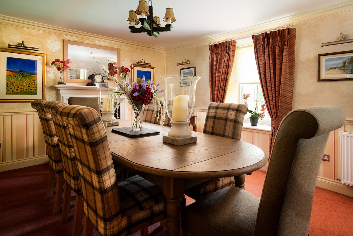 Dryburgh Farmhouse - separate dining room with dining table which seats six but can extend to seat 8