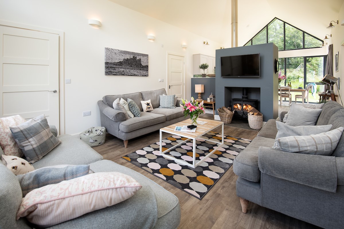 Mallow Lodge - living area - please note there are now two sofas and two armchairs rather than three sofas