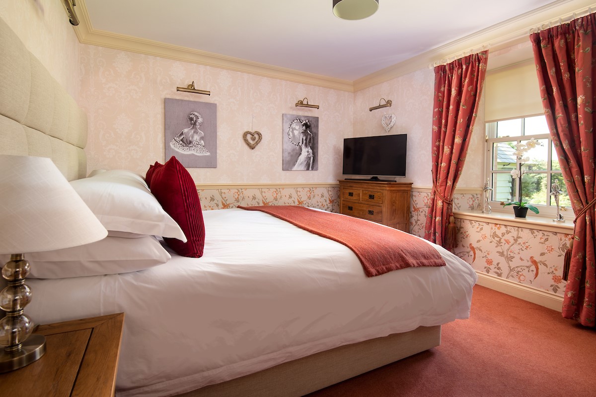 Dryburgh Farmhouse - bedroom four where views can be enjoyed from the comfort of the super king bed