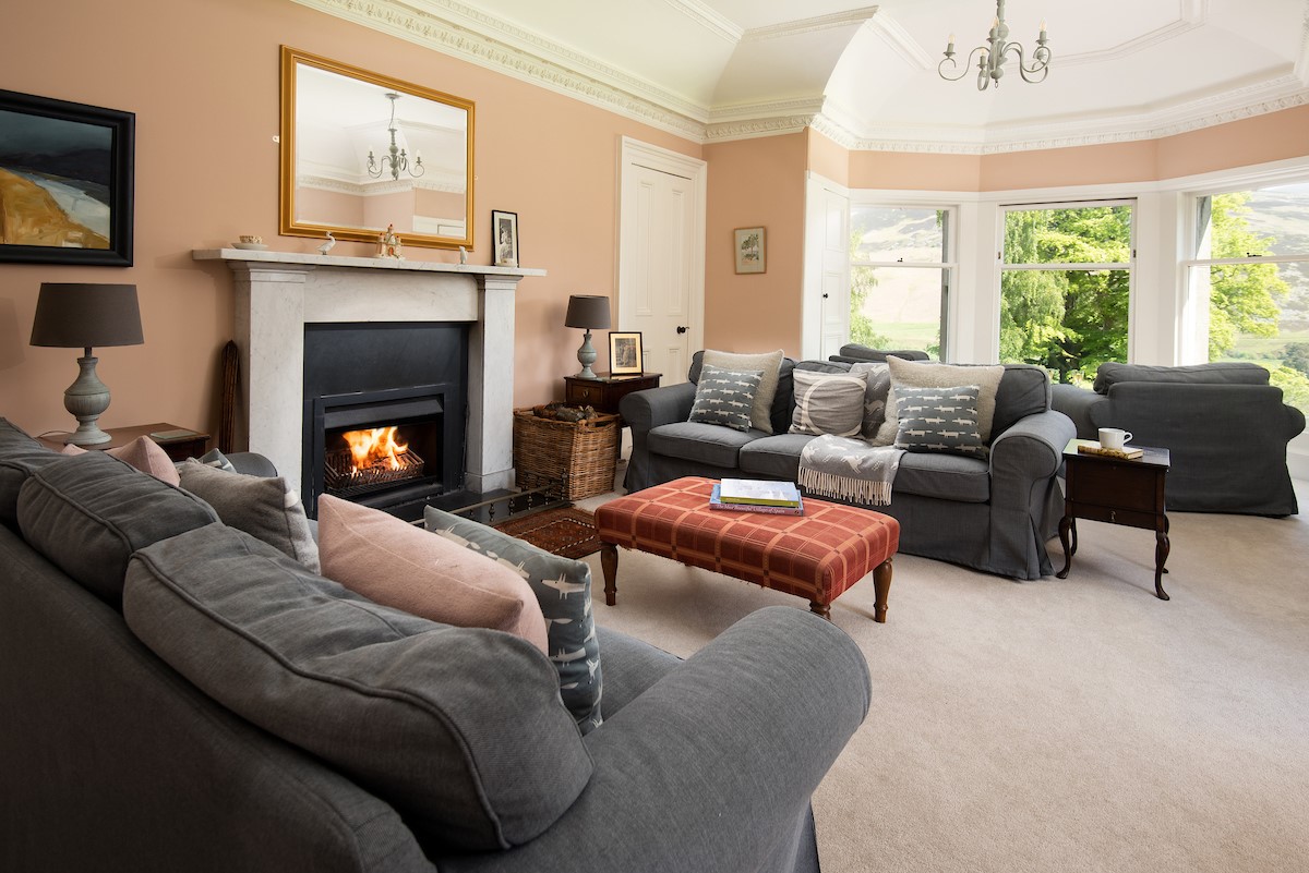 Mossfennan House - cosy open fire and superb views in the first floor drawing room