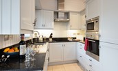 The Mast House - kitchen with granite work surfaces