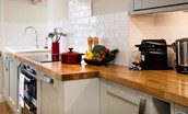 Crosslea - kitchen with Nespresso machine and red accents