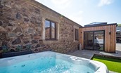 The Stables at West Moneylaws - hot tub area in the courtyard garden