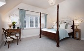 South Lodge - bedroom two with four poster bed