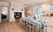 Berryburn Cottage - dining area in the kitchen with wood burning stove