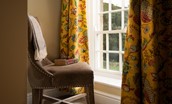 Aydon Castle Cottage - enjoy a good book by the window in bedroom one
