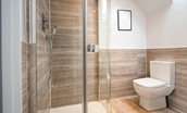 Mullins House - en-suite shower room with rainfall shower head and additional attachment