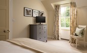 Crailing Coach House - bedroom one with views into the garden